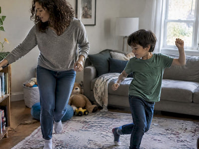 Parent and child starting a screen-free dance break