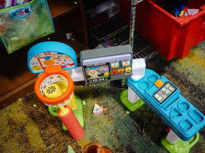 Children's toys scattered on the floor