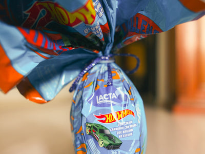 Hot wheels themed easter egg wrapped in blue foil.