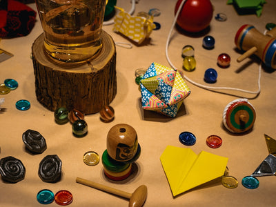 Collection of vintage toys and marbles on a surface