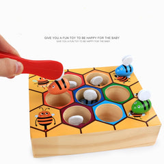 Wooden beehive tweezer game