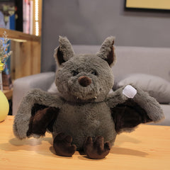 Fluffy bat plush in dark grey