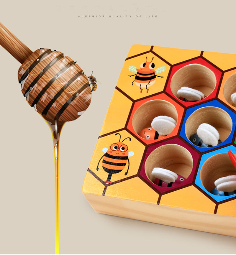 Wooden tweezers and bees