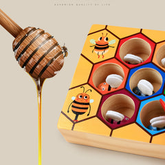 Wooden tweezers and bees