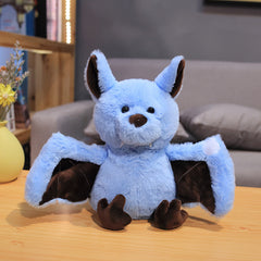 Fluffy bat plush in dark blue