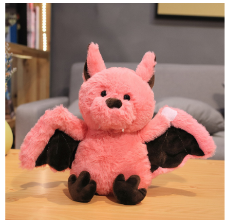 Fluffy bat plush in pink