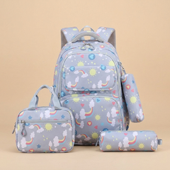Three piece kids school backpack set with pencil case on a beige studio background