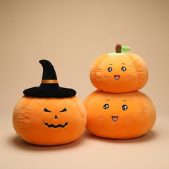 Pumpkin Pals plush dolls on a beige studio background