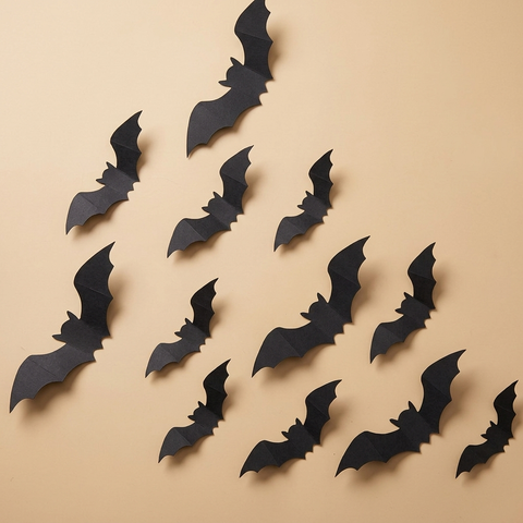 3D bat wall stickers on a beige studio background