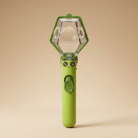 Kids bug catcher and magnifier on a beige studio background