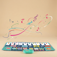 Baby musical crawling mat on a beige studio background