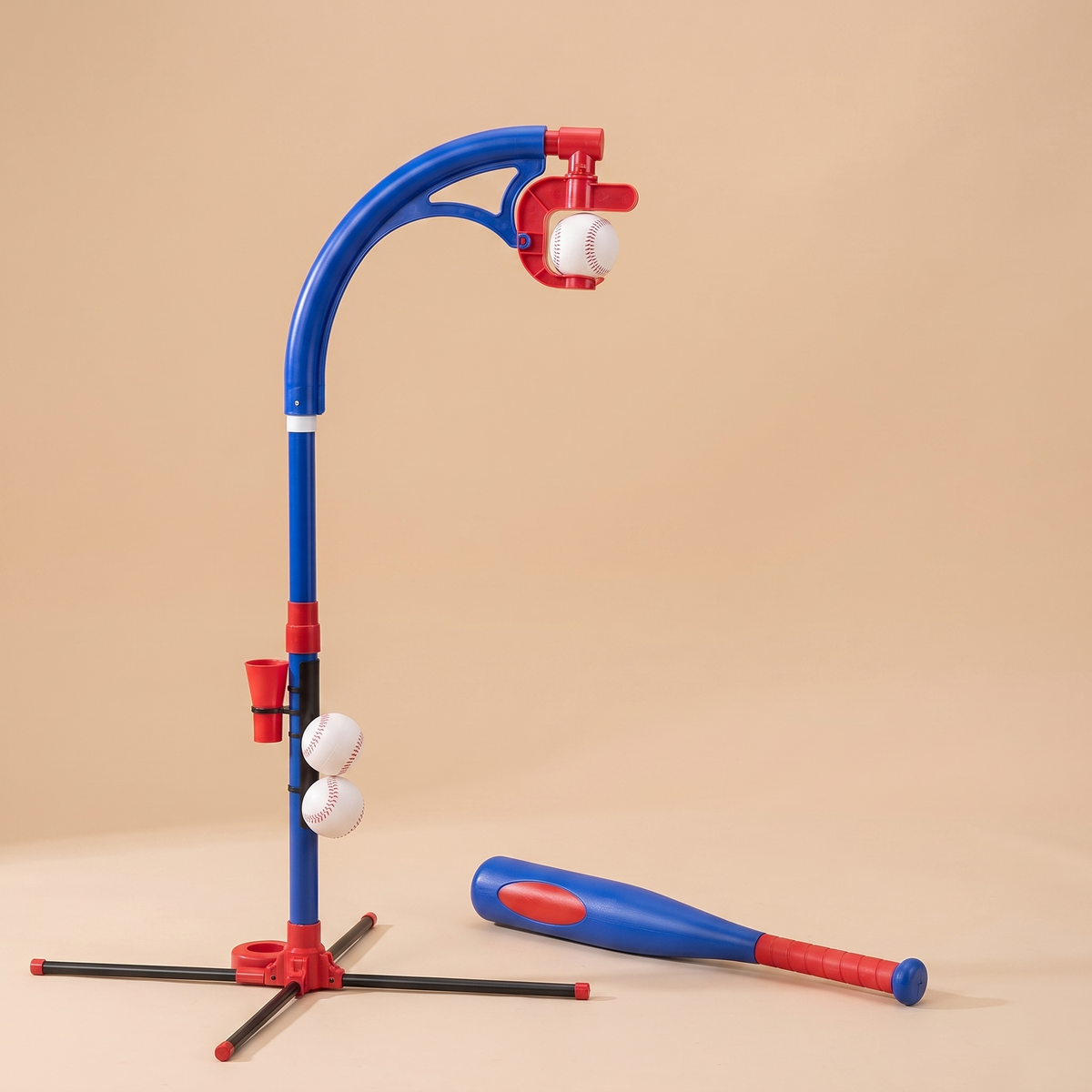 Children's automatic serve baseball trainer in blue with bat and tee