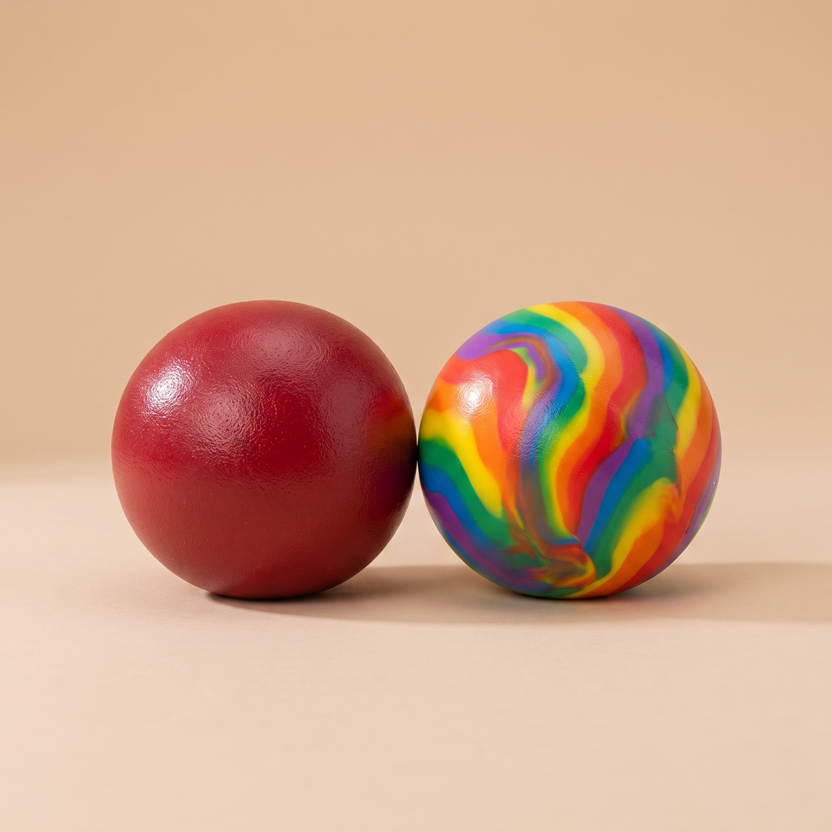 Handmade textured squish stress balls in red and rainbow multicolour