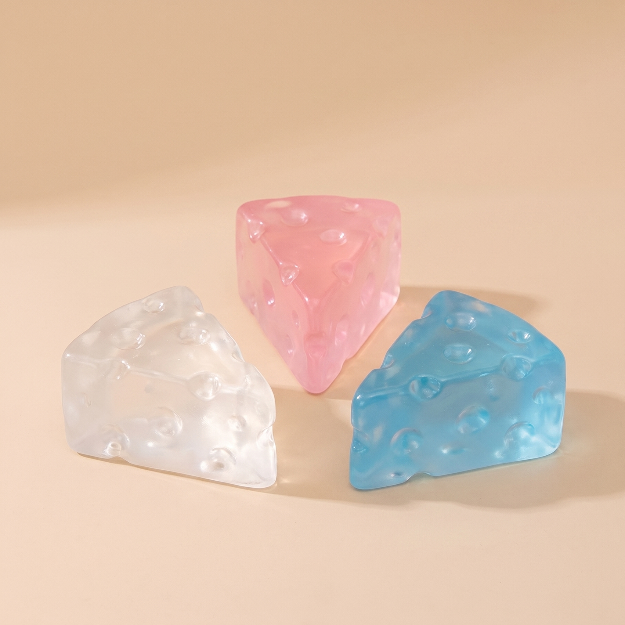 Slow rise squishy cheese fidget toys in clear, pink and blue