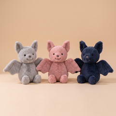 Soft fluffy bat plush toys in grey, pink and dark blue