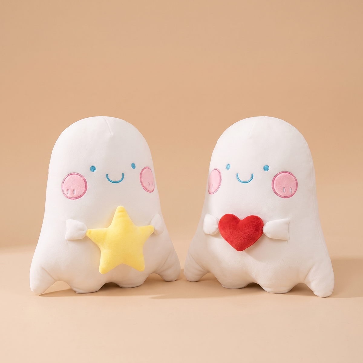 Soft white ghost plush dolls holding a star and a heart