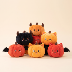 Pumpkin imp plush toy family studio hero image