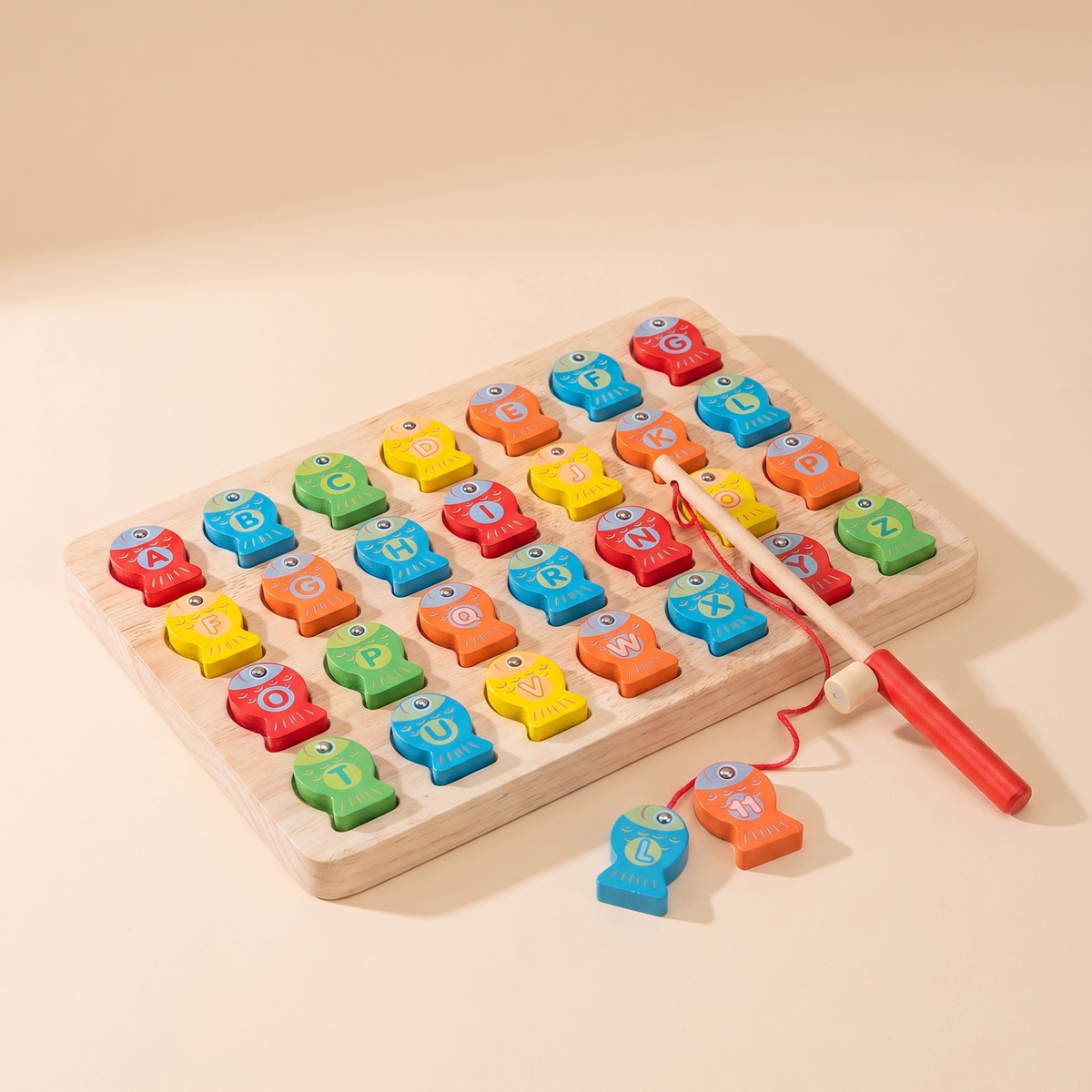 Wooden magnetic letter fishing game studio hero image