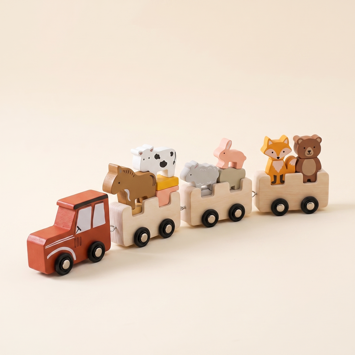 Wooden farm animal train studio hero image